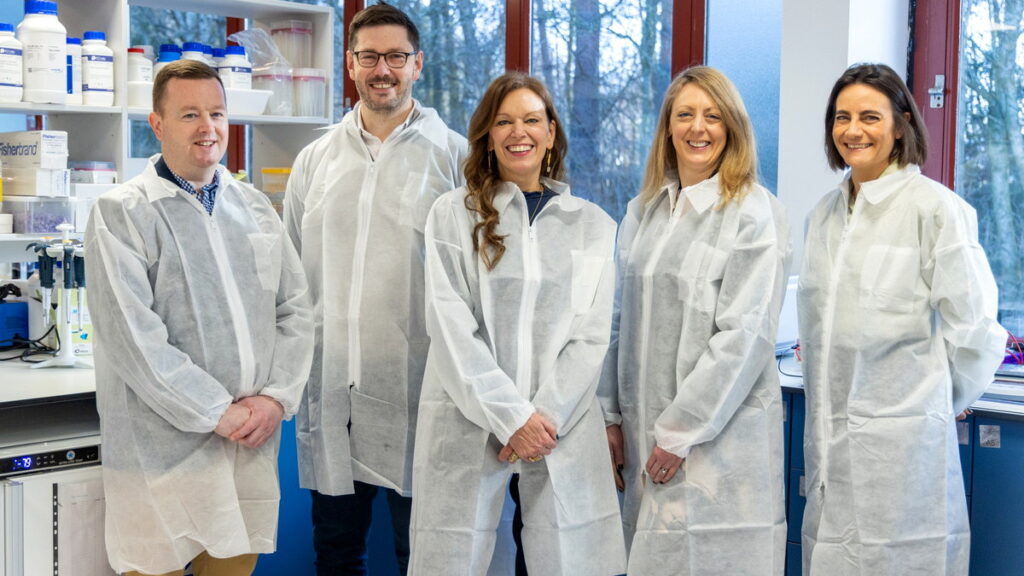 MiAlgae founder Douglas Martin with Scottish National Investment Bank representatives in a laboratory