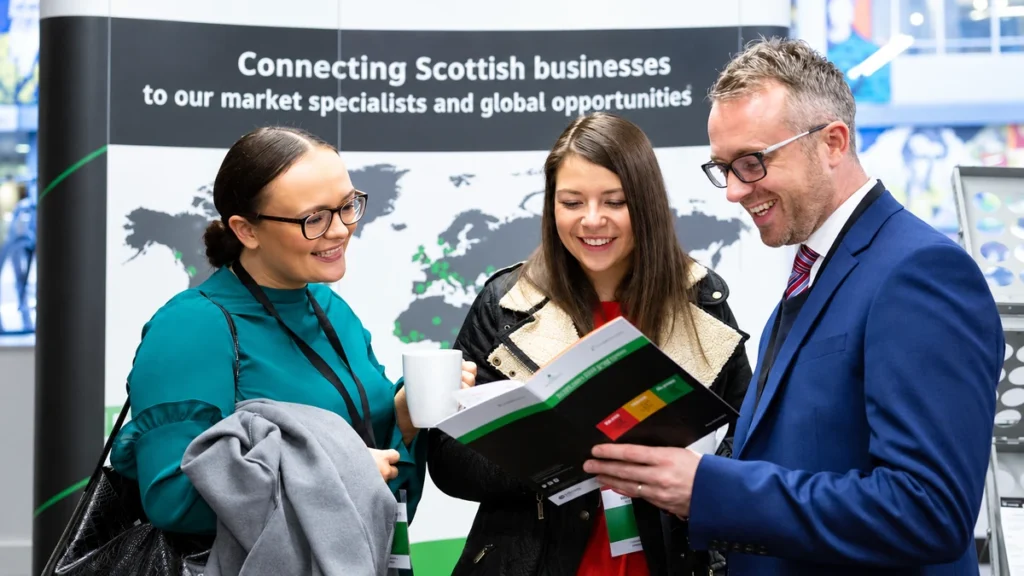 Scottish business representatives discussing international trade opportunities at a Scottish Enterprise event